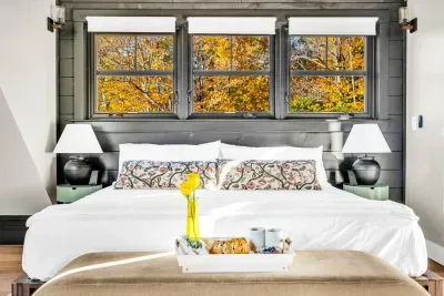 Your stylishly designed master bedroom with a california king bed!