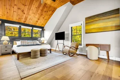 Here we have the 2nd master bedroom, once again fitted with a california king bed, smart TV, and ensuite bathroom!