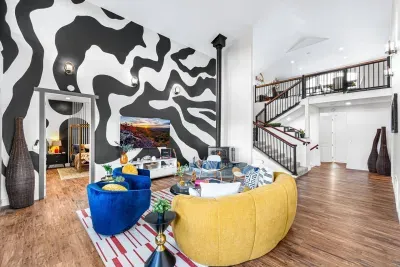 Immerse yourself in breathtaking Blue Ridge Mountain views, enjoy exceptional amenities, and admire the stunning custom murals that adorn the space!