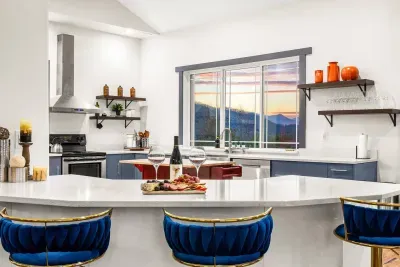 The counter is the perfect accompaniment to the kitchen!  An inviting space that is well designed for sharing appetizers, treats, a buffet, and breakfast while gazing at the view!