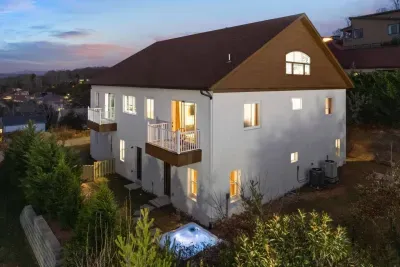 The hot tub allows privacy and still a generous slice of Blue Ridge mountain view!