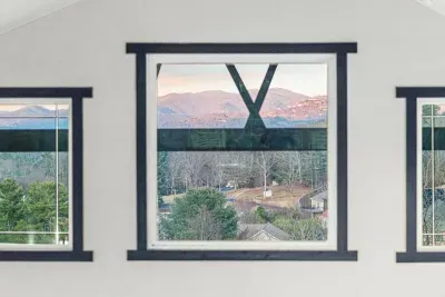 Now we ascend upstairs to the loft with more mountain views, musical murals, with luxuriously comfortable furniture.  Play cards with four, chat or zone out to a show on the smart TV.

Also enjoy the eagle's eye view of the massive living room mural!