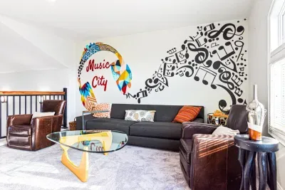 Ascend upstairs to the loft for mountain views, musical murals, with luxuriously comfortable furniture.  Play cards with four, chat or zone out to a show on the smart TV.

Also enjoy the eagle's eye view of the massive living room mural!