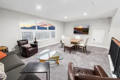 Now we ascend upstairs to the loft with more mountain views, musical murals, with luxuriously comfortable furniture.  Play cards with four, chat or zone out to a show on the smart TV.

Also enjoy the eagle's eye view of the massive living room mural!