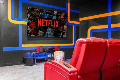 In the downstairs area... everybody has the best seat in the theater with amazingly comfortable, soft leather recliners!  Enjoy some popcorn and the latest movie on the 98-inch screen!