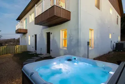 Our brand new hot tub comfortably seats 6 guests.  Settle into relaxation while taking in the views of the mountain line.  Melt away the stress!