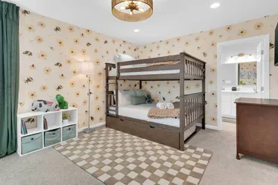 Bedroom 4 (Upstairs) - Kids Room with a bunk and trundle bed.