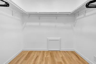 Bedroom 1: Large walk in closet.