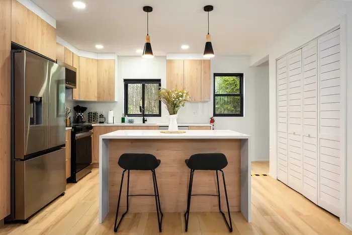 Bright modern kitchen with island seating and stylish finishes