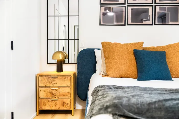 Stylish modern bedroom with plush accents and chic designer details