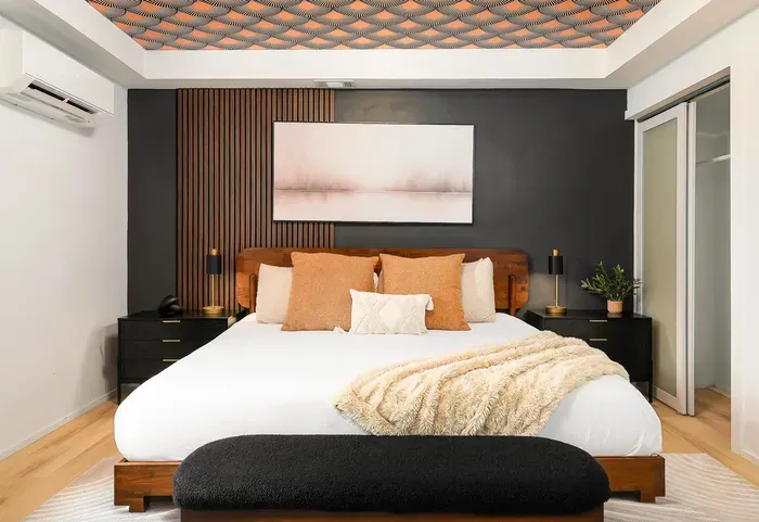 Elegant king bedroom with designer accents and a cozy modern feel