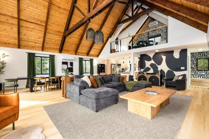 Stunning vaulted great room with loft, designer style, and spacious seating