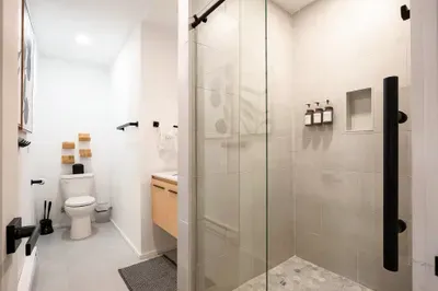 Bright modern bathroom with sleek walk-in glass shower