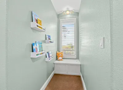 Upstairs Bedroom - Kids Corner with books and toys.