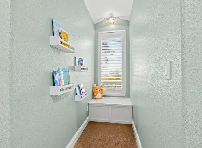 Upstairs Bedroom - Kids Corner with books and toys.