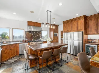 Kitchen - Double oven, Two refrigerators, Wine fridge, Coffee Bar, Views of backyard and Vineyards.