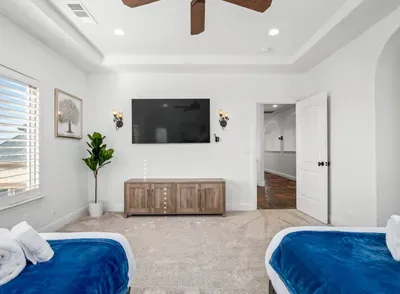 Upstairs Master Bedroom - Two Queen Beds and TV.