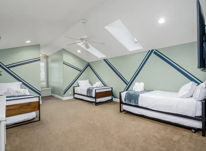 Upstairs Bedroom - Three Twin Trundle Beds. Sleeps 6.