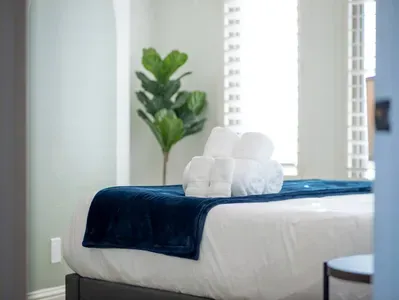 Each bedroom has a full set of towels.