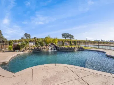 Swimming Pool with a sun shelf for basking in the sun.