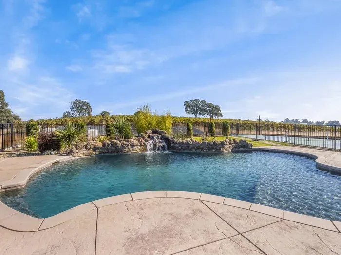 Swimming Pool with a sun shelf for basking in the sun.