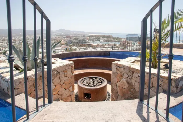 Swimming pool fire pit