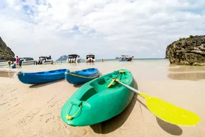 sandy-beach-with-kayaks- luxury vacations retreat