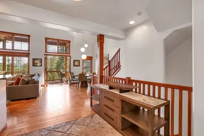 Explore Downstairs Comfort: Head downstairs to discover two welcoming guest bedrooms, a convenient Jack and Jill bathroom, and a fully-equipped laundry room.