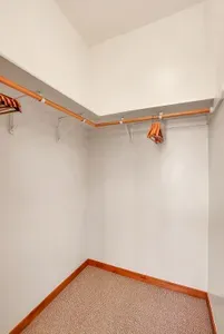 Walk-In Wonder: The spacious walk-in closet in the primary suite offers ample room to organize your wardrobe and gear, making it easy to keep your space tidy and clutter-free