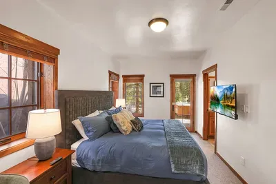 King-Sized Guest Bedroom Captions for Timberline Lodge:
Spacious Retreat: Enjoy the comfort of the king-sized bed in the guest bedroom, offering plenty of space to stretch out and relax after a day of exploration.