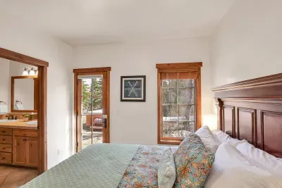 Tranquil Retreat: Unwind in the queen bedroom, where comfort meets tranquility. With soft linens and a peaceful ambiance, it's the perfect spot to relax and dream of your next adventure.