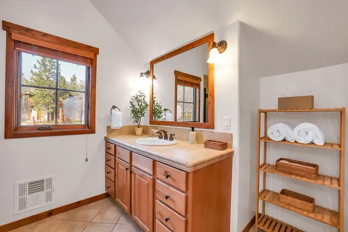 Elegant & Functional: Featuring modern fixtures and generous counter space, the primary bathroom combines style with practicality, ensuring a refreshing start or end to your day.
