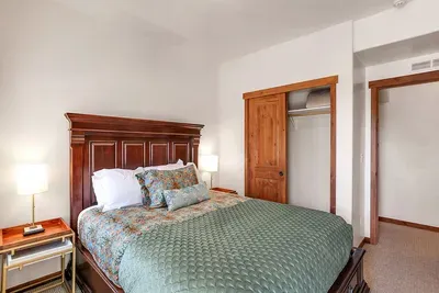Cozy Comfort in the Queen Bedroom: This inviting queen bedroom blends comfort with style, offering a serene space to relax and recharge. With tasteful decor and plush bedding, it's your personal retreat after a day of adventure. It also has a smart TV