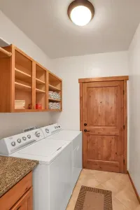 Efficient & Spacious: The full-sized laundry room offers ample storage space, making it easy to keep your essentials organized and your adventure gear ready for action.