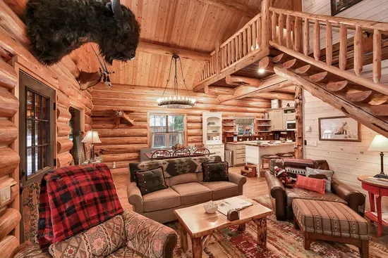 The open kitchen and dining room keep the cook in the conversation, with the great room and pellet stove just a few steps away
