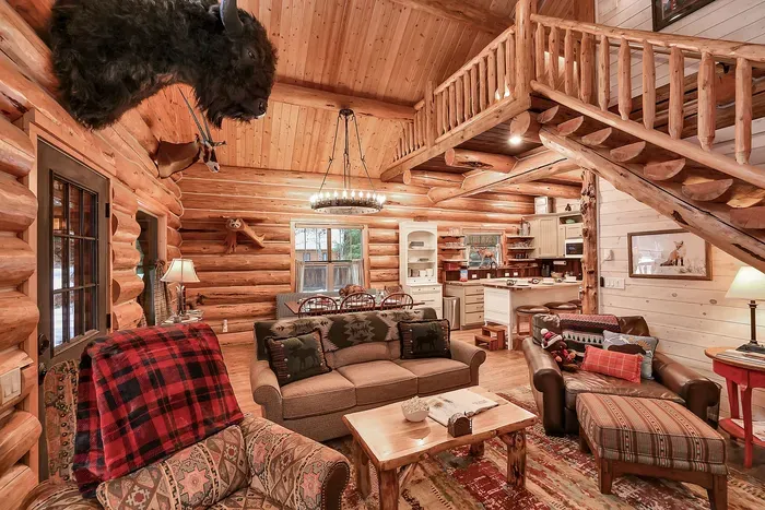 The open kitchen and dining room keep the cook in the conversation, with the great room and pellet stove just a few steps away