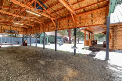 The big covered carport at Alder & Antler keeps your rig, boat, or trailer out of the weather—easy in, easy out in every season