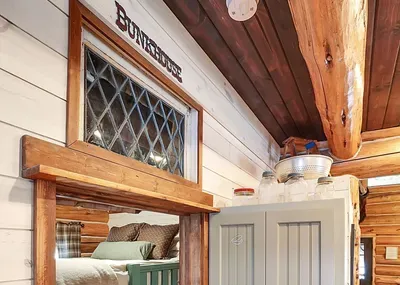 Right down the hall from the main bath and steps from the living room, the bunkhouse feels tucked away but still part of the cabin hum