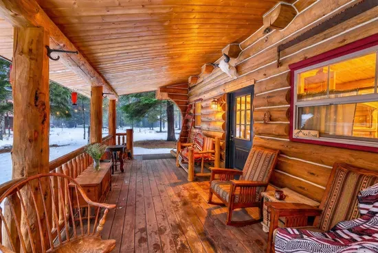 Step onto the porch and into simple cabin comfort—woods first, comforts close
