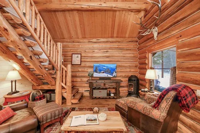 Drop your bags, sink into the sofa, and let the pellet stove glow and timber beams tell you you’re off the clock