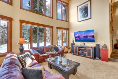 The kind of main room where boots line up by the door and gloves dry by the fire.