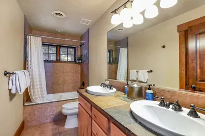 Simple, clean bathrooms with plenty of space for shared mornings (2nd floor bathroom)
