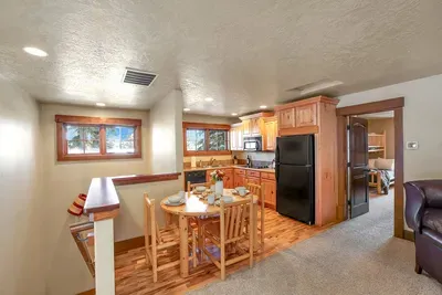 With its own living area and dining space, the above-garage apartment is ideal for families or friends looking for extra room during their stay