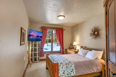 Queen bedroom on the main floor for easy access and fewer stairs.