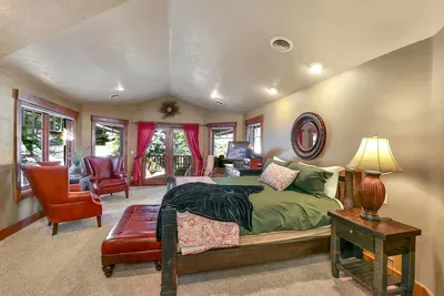 Primary suite with king bed, gas fireplace, and room to actually unwind.