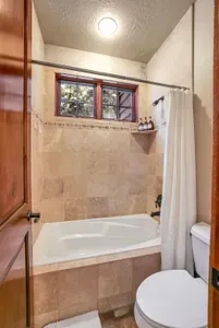 A spacious main floor bathroom, fully stocked and with Soapbox amenities