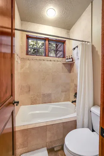 A spacious main floor bathroom, fully stocked and with Soapbox amenities