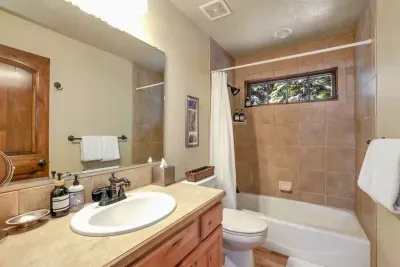 Apartment bathroom with everything you need for a self-contained stay.
