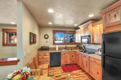 Apartment kitchen stocked for simple meals, snacks, and early coffee runs.
