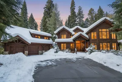 Lodge details that feel familiar from old ski trips, upgraded for today. Garage bay access for one car and overflow gear.
